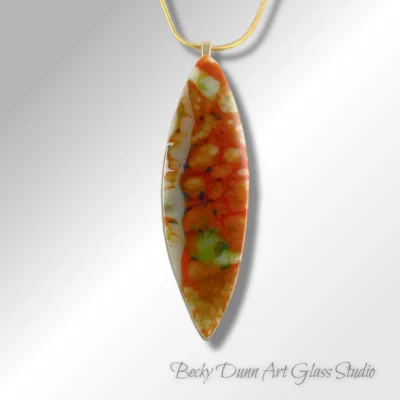 1283 shield large pale green and orange aventurine green mix front close